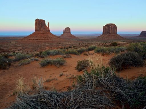 A breathtaking sunset over the monument valley and its iconic rocks, USA