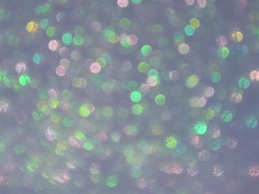 An abstract colorful blurry background with bokeh lights