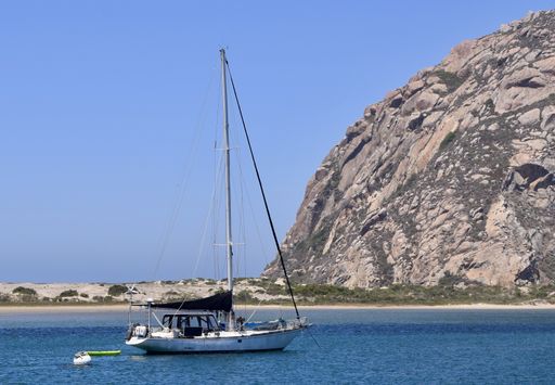 A Sailboat in front of Morro Bay Rock, USA
