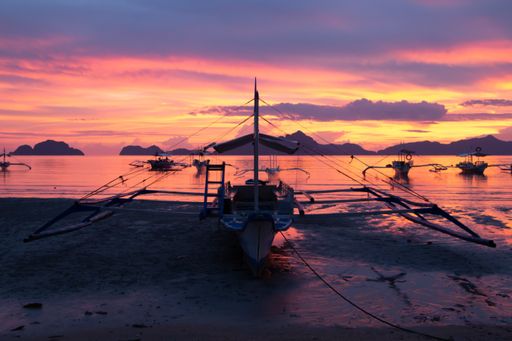 A beached boat off the coast of El Nido, Palawan island in the Philippines