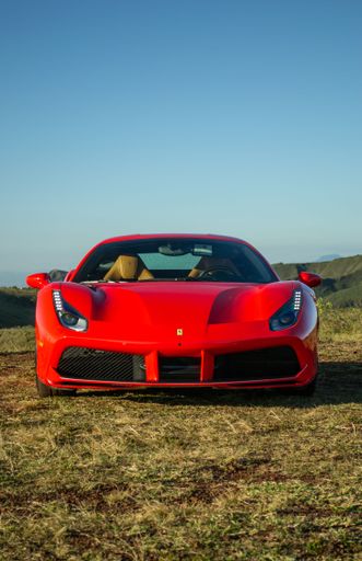 A vertical shot of a red Ferrari 488 GTB. Belo Horizonte, Brazil.