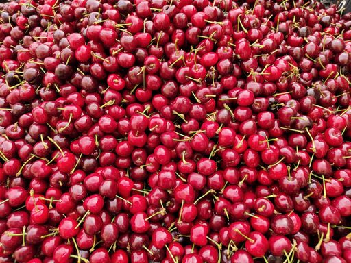 An overhead shot of a bunch of cherries