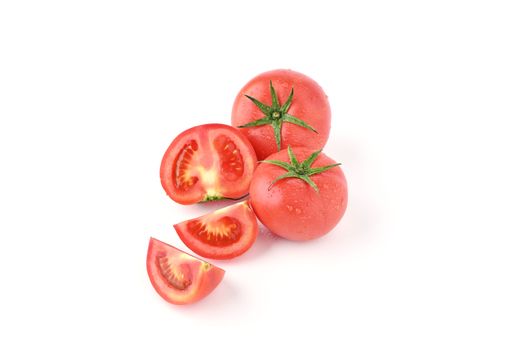 A closeup of ripe tomatoes isolated in white background