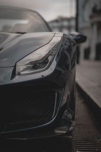Blue Ferrari 488 Pista parked in London showing of its uniqueness and details. After a rainy day the light was just perfect to capture those angles.