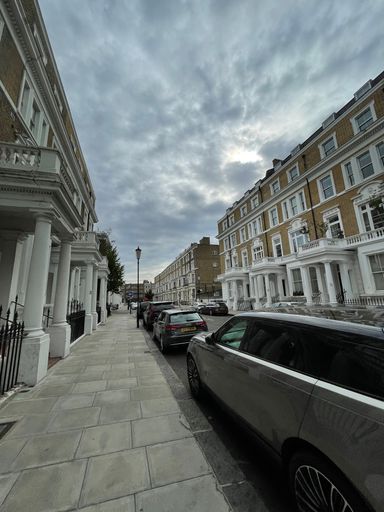 A view of the streets and buildings of London on a cloudy day
