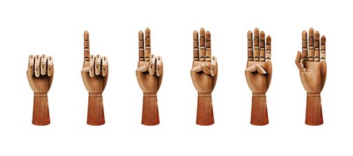 a shot of dummy wooden mannequin hands counting to five with fingers isolated on white background