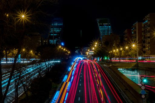 A shot of long exposure of lights over a highway at night in Madrid