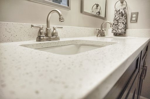 A low angle shot of modern marble bathroom sink design