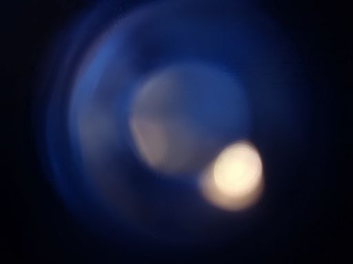 An abstract bokeh camera lens shape for background or wallpaper