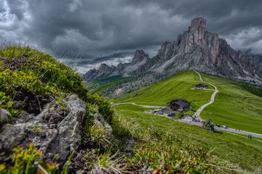 A dramatic shot of the Giau Pass and its road in the Dolomites in the province of Belluno in Italy