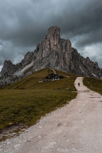 A dramatic shot of the Giau Pass and its road in the Dolomites in the province of Belluno in Italy