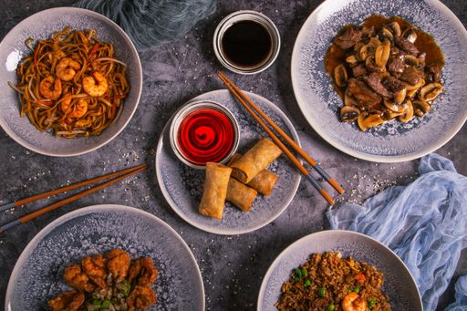 A vertical top view of a variety of Chinese cuisine dishes