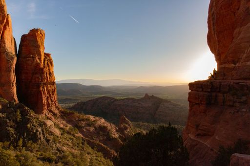 Scenic view of mountains and red rocks from Cathedral Rock in Sedona, Arizona.