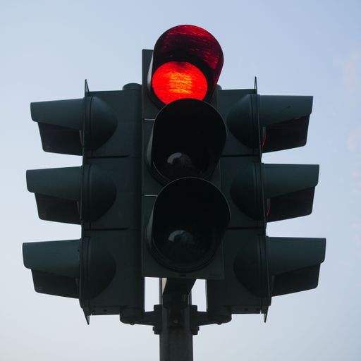A closeup shot of a red traffic light