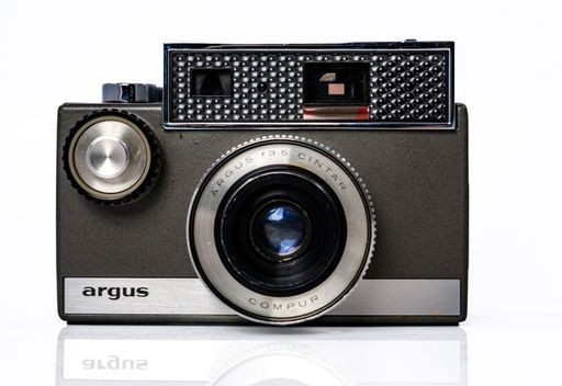 A closeup of a vintage Argus Autotronic 35 film camera isolated on the white background.