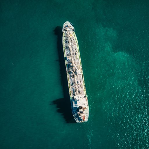 An aerial view of a bulk carrier cargo ship carrying freights