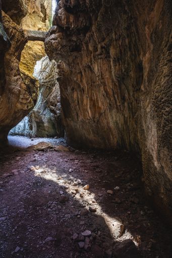 A breathtaking view of the narrow path between the enormous rocks