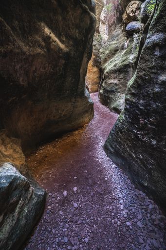 A breathtaking view of the narrow path between the enormous rocks