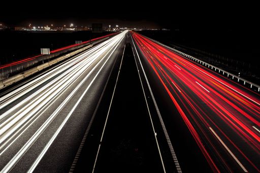 A long exposure to highways with traffic lights in the night