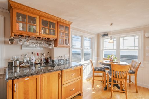 An inside view of the modern dining room made of wood