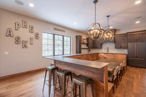 An inside view of the modern kitchen made of wood