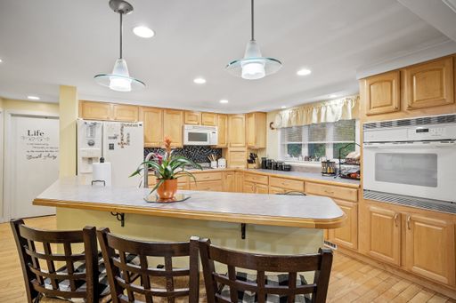 An inside view of the modern kitchen made of wood