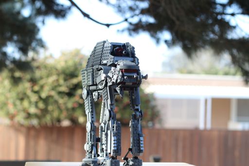 A shallow focus shot of a Star Wars AT-M6 transformer lego toy