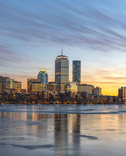 A vertical shot of the Boston skyline at sunset. Massachusetts, United States.
