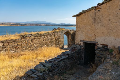 The ruins of an old building captured during the daytime by the sea