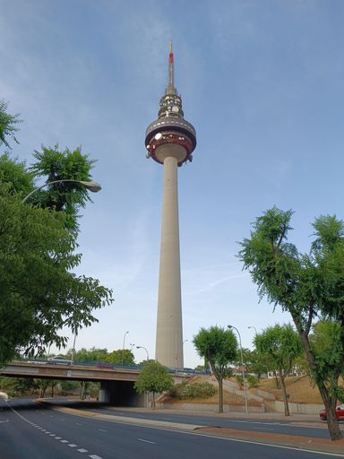 A low-angle shot of a television tower called Piruli, Madrid