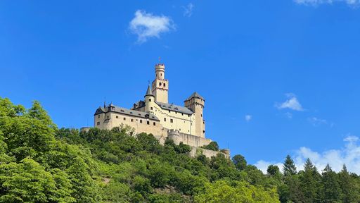 The Marksburg castle on top of the hill surrounded by forest, Germany