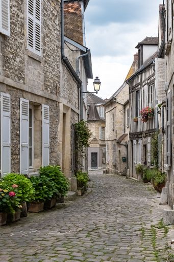 Senlis, medieval city in France, typical street with ancient houses