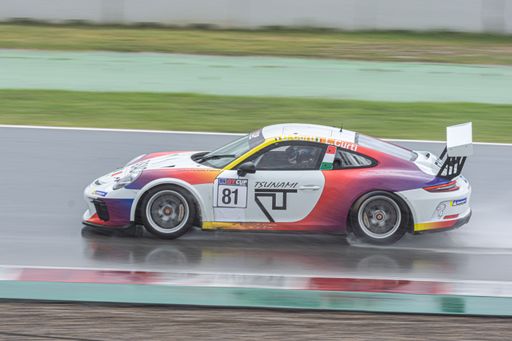 racing car in the wet track, raining day. Porsche 911 Cup my 2018