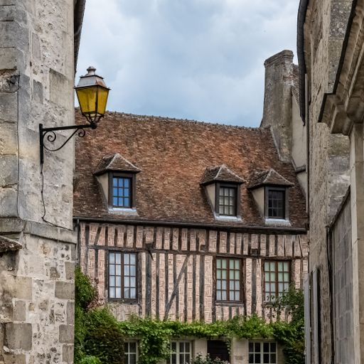Senlis, medieval city in France, typical street with ancient houses