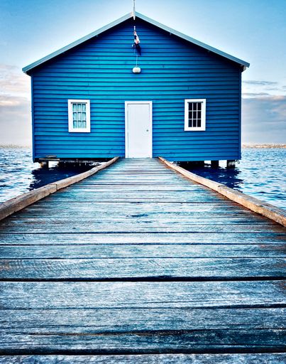 a closeup shot of a Blue Boat House located on the Swan River at Crawley in Perth, Western Australia
