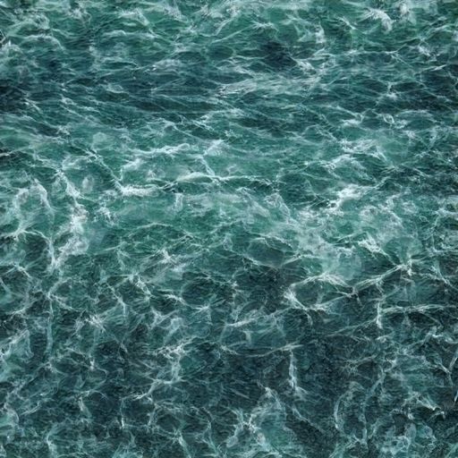 A high angle view of sea waves under the lights - perfect for wallpapers and backgrounds