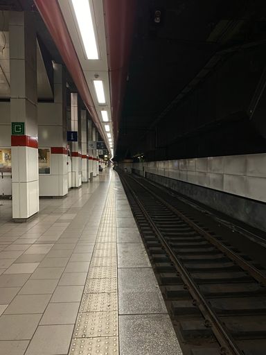 A vertical shot inside an empty subway station