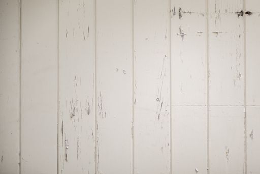 A closeup shot of a white wooden surface - great or background or a blog