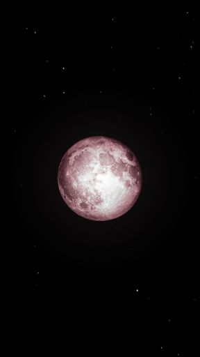 A vertical shot of the full moon in a dark sky