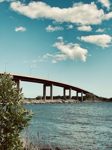 A vertical shot of a bridge over the bay of Quinte in Belleville, Ontario, Canada