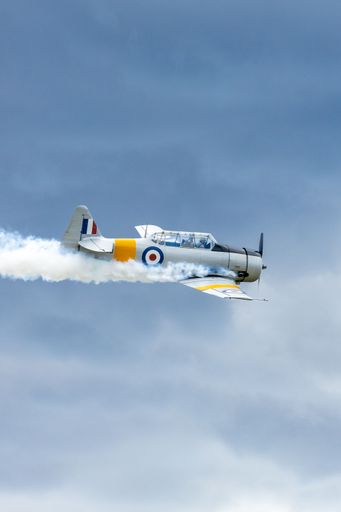 A vertical shot of airplane in flight at Kjeller airport in Oslo