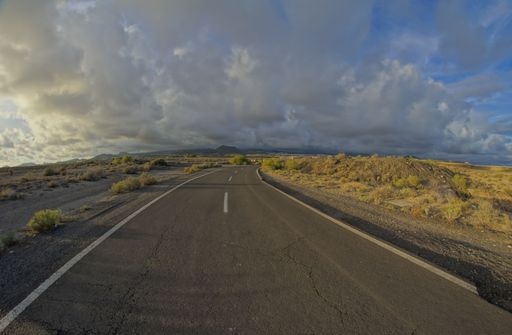 Long Empty Desert Road on a Cloudy Day