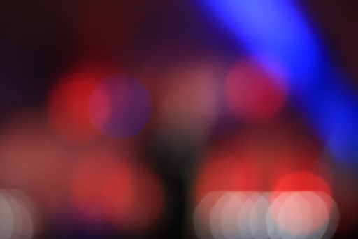An abstract colorful background with red and blue bokeh lights