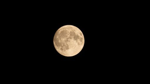 The full moon on the black sky with a copy space - great for backgrounds