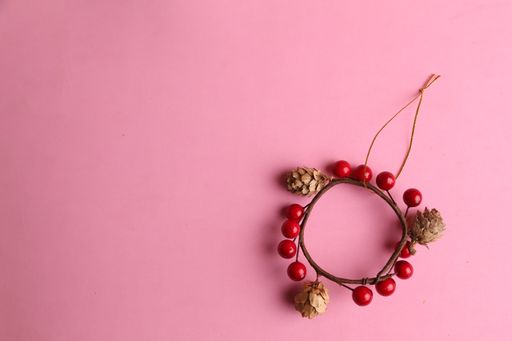 A Christmas center with branches and red balls
