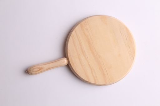 A closeup shot of a kitchen board for cutting sausage and meat
