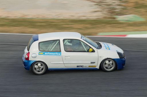 racing car in the asphalt track. Renault clio