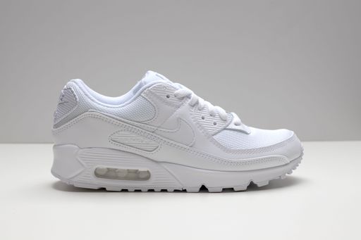A closeup of triple white Nike Air Max 90 sneaker.