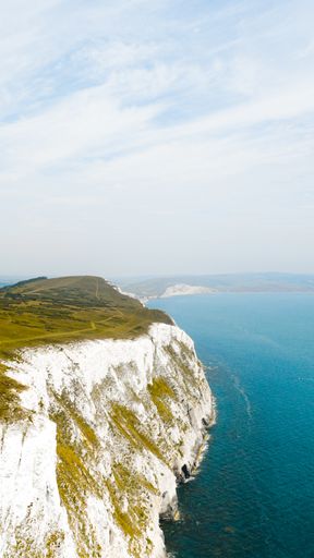 A vertical high angle shot of  Isle of Wight in the United Kingdom under the bright light blue sky