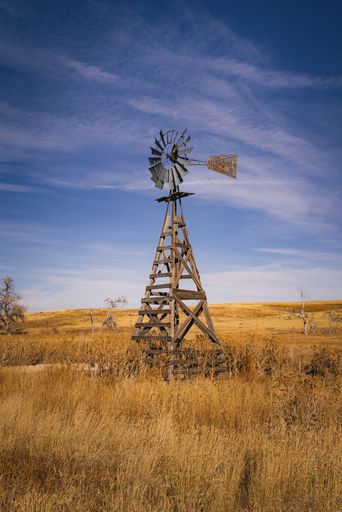 An old wooden windmill in the middle of Pronghorn Natural Wilderness area